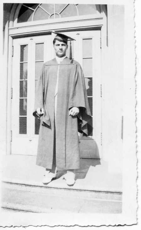 Grandpa Loren Poses After His Graduation Ceremony
